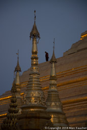 Monks Collecting Gold Leaf on Shwedagon Pagoda