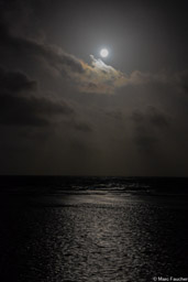 Full moon over South Water Caye