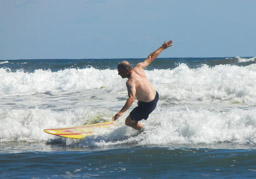 Marc rides his wave at Playa Las Flores, El Cuco