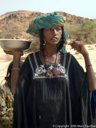 Tuareg Woman selling goat cheese